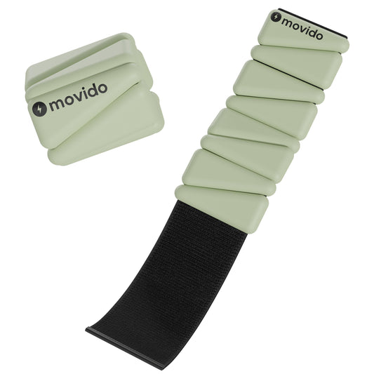 Minimalist sage green wrist and ankle weights styled with athleisure for home workouts